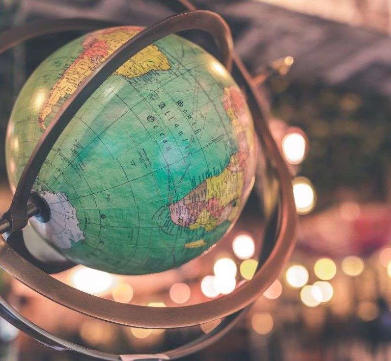 negative-space-vintage-globe-world-map-bokeh-artem-bali-thumb-1